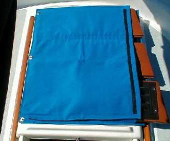 Slide the companionway slats in and close the flap