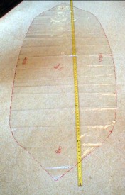 The easiest piece, not too large and no vinyl windows, goes between the first and second bows